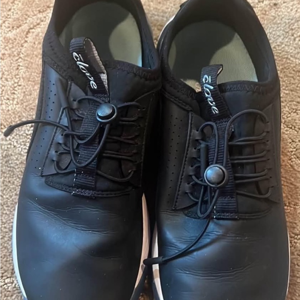 Black Athletic Shoes with Toggle Lacing and Minimalist Design